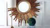 Add glam to your room with Round Sunburst Mirror