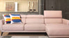 Gorgeous and elegant pastel pink sofa for a modern interior.